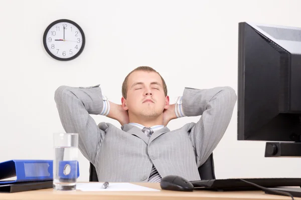 Young business man sleeping at work — Stock Photo, Image