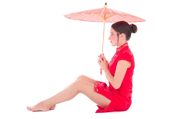 Young beautiful sitting woman in red japanese dress with umbrell — Stock Photo, Image