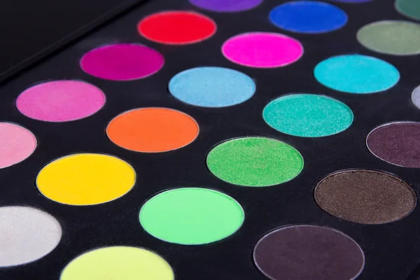 Make up colorful eyeshadow palettes over black — Stock Photo, Image