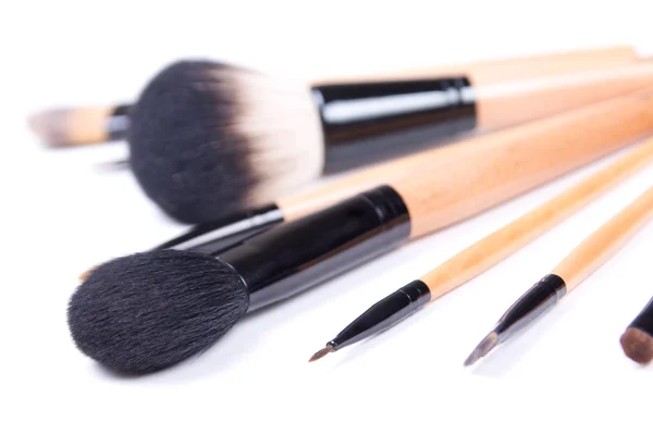 Close up of professional make-up brushes over white — Stock Photo, Image