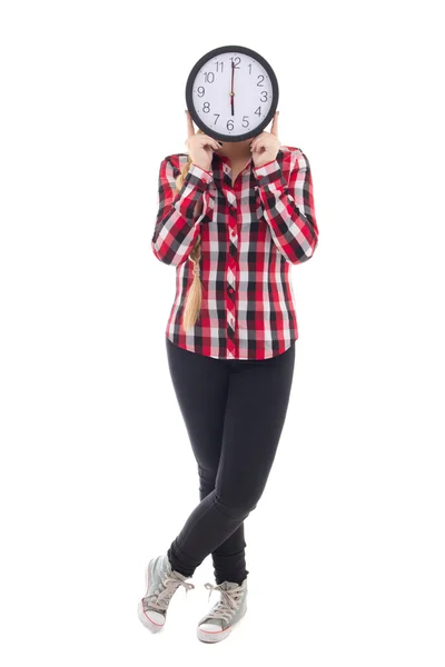 Teenage girl with clock covering face isolated on white — Stock Photo, Image