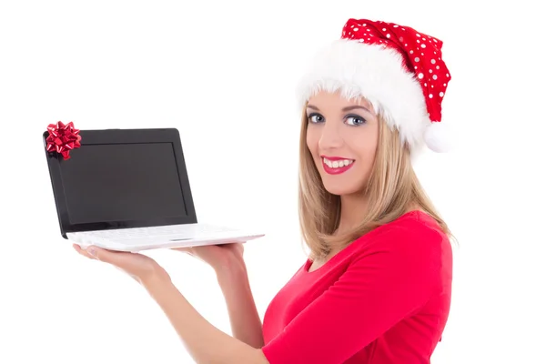 Feliz mujer con sombrero de santa comprar regalos por internet —  Fotos de Stock