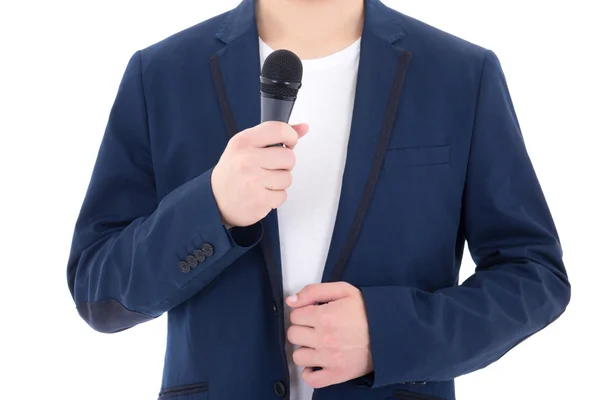 Homem de terno com microfone isolado no fundo branco — Fotografia de Stock