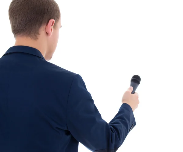 Reporter håller mikrofon isolerad på vit bakgrund — Stockfoto