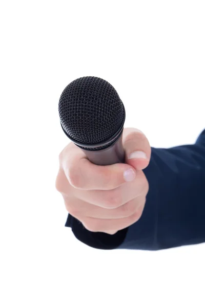 Journalist's hand holding a microphone isolated on white — Stock Photo, Image