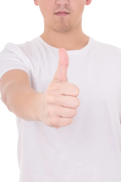 Close-up de jovem nos polegares de t-shirt branca acima — Fotografia de Stock