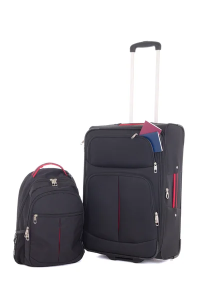 Resväska med pass och ryggsäck isolerad på vita bak — Stockfoto