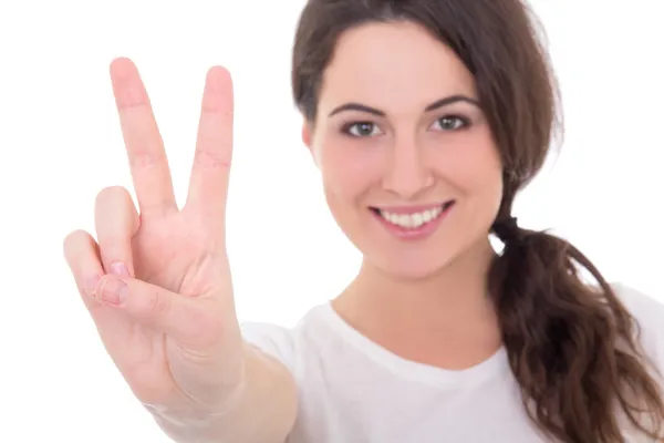 Portrait of happy young woman giving peace sign isolated on whit — Stock Photo, Image