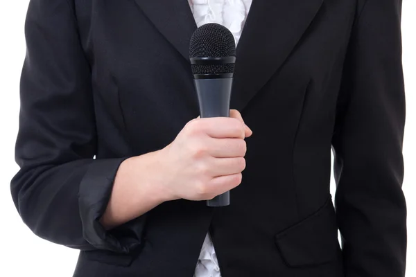 Black microphone in female journalist's hand — Stock Photo, Image