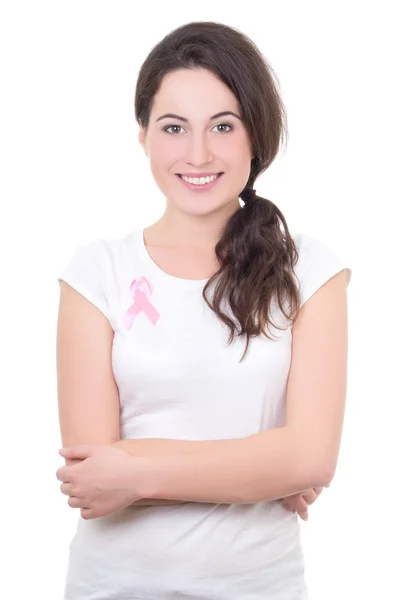 Giovane donna con nastro rosa cancro sul seno isolato su wh — Foto Stock