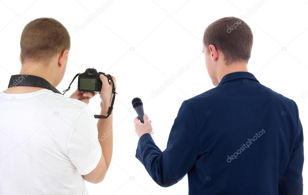 reporter with microphone and photographer with camera