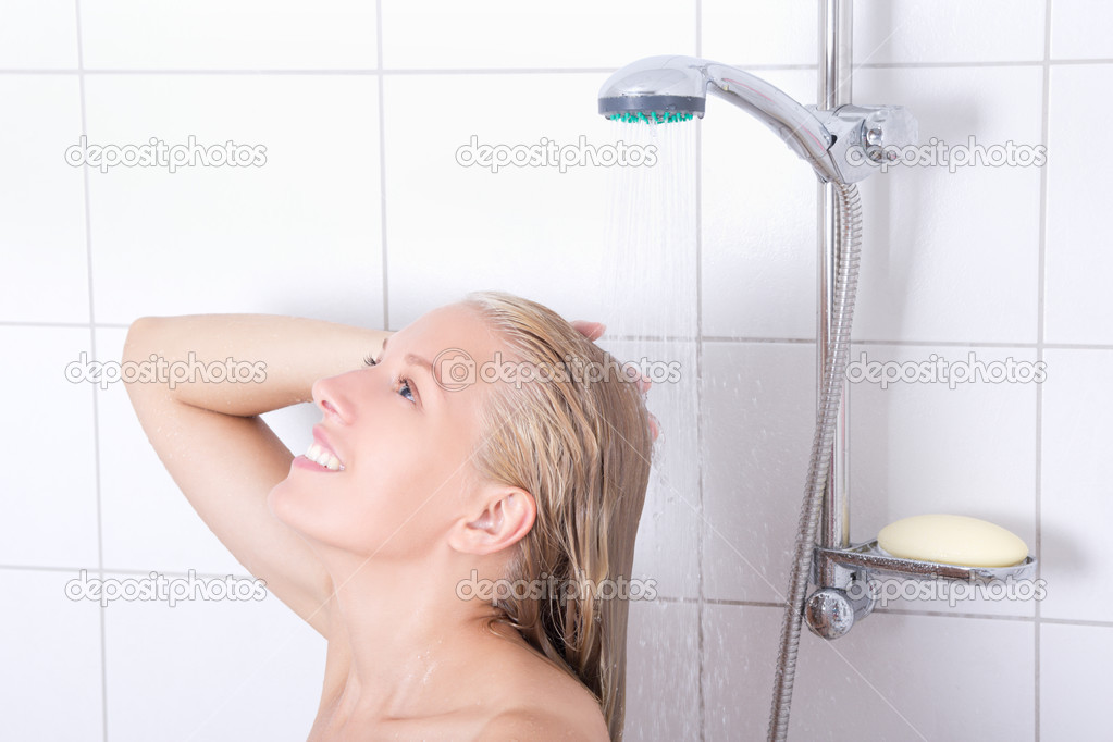 young attractive blondie woman having a shower
