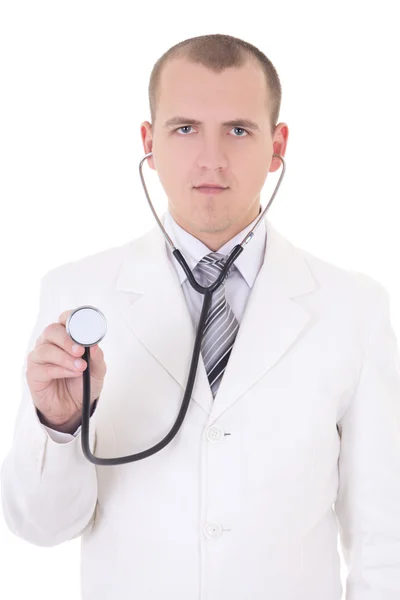 Jonge mannelijke arts met behulp van stethoscoop geïsoleerd op wit — Stockfoto