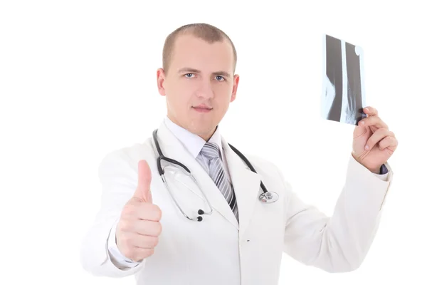 Young doctor analyzing x-ray and thumbs up isolated on white — Stock Photo, Image