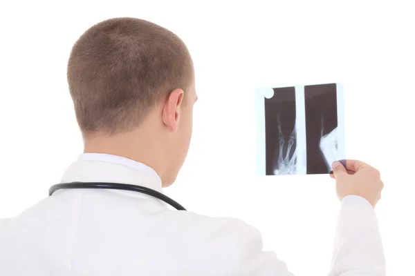 Bakifrån av unga läkare analysera röntgen isolerad på vit — Stockfoto