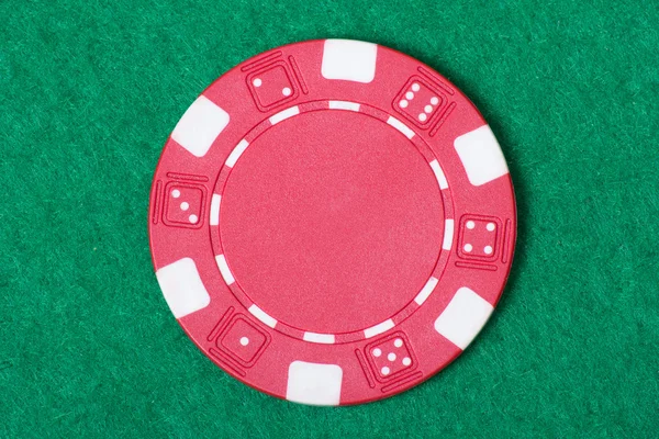 Red poker chip on the casino table — Stock Photo, Image