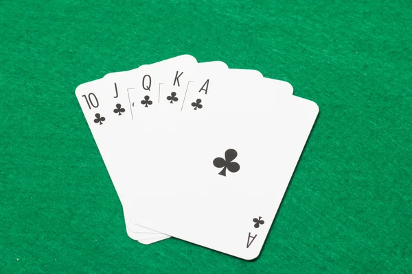 Royal flush combination at poker on the green felt — Stock Photo, Image