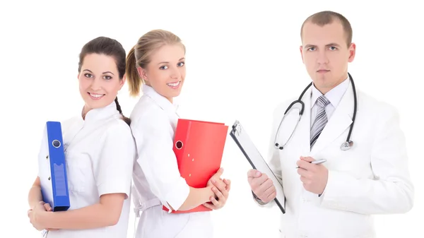 Homme médecin et deux infirmières jeunes isolés sur blanc — Photo