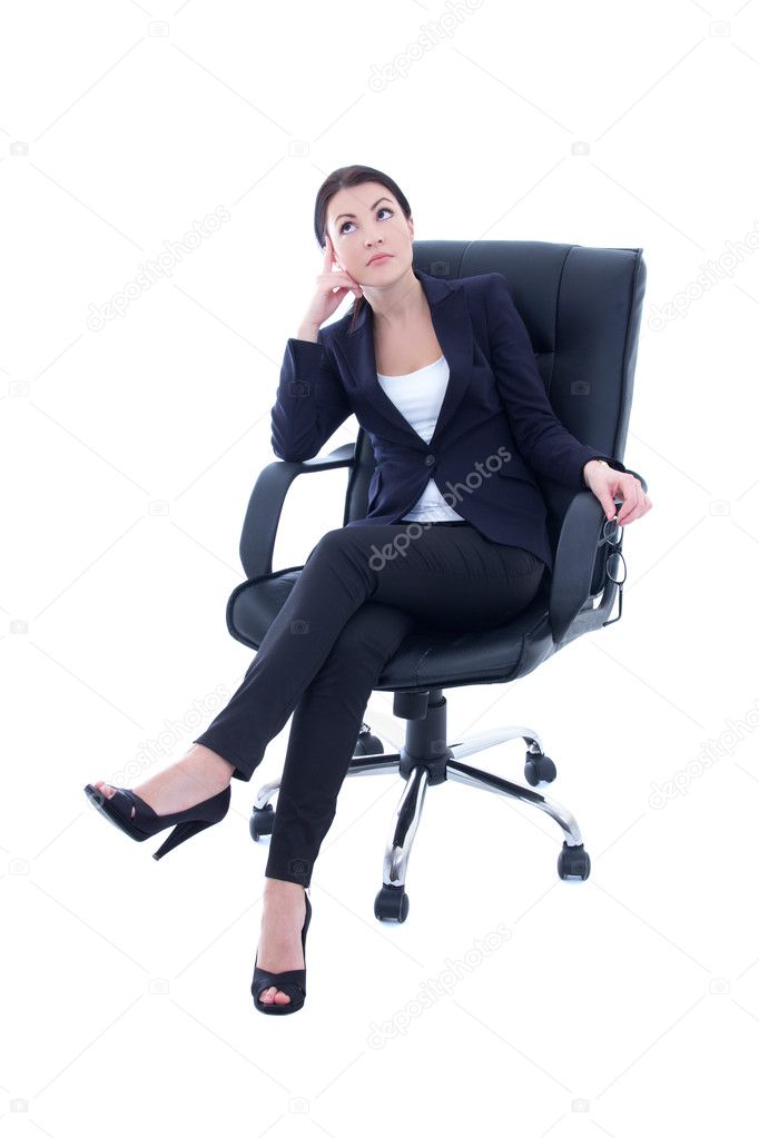 young beautiful business woman sitting on the chair and dreaming