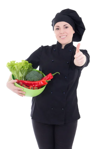 Unga attraktiva cook kvinna i svart uniform med grönsaker Tor — Stockfoto