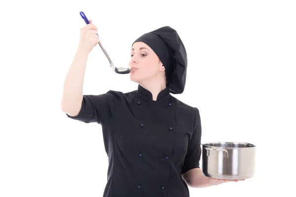 Ritratto di donna giovane cuoco in padella tenuta uniforme nera e ta — Foto Stock