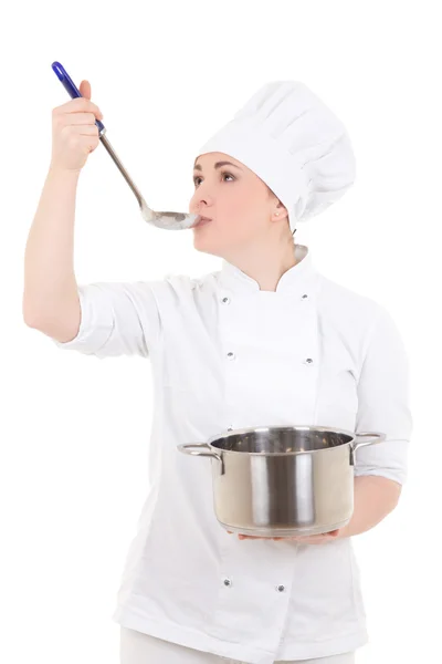 Portrait of young attractive cook woman in uniform with pan tast — Stock Photo, Image