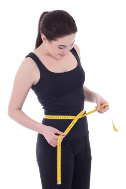Sportif kadın üzerinde beyaz izole beline ölçme