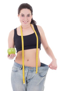 mutlu güzel ince kadın büyük Jeans ile elma ve ölçme