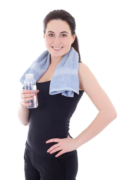 Young sporty woman with bottle of mineral water isolated on whit — Stock Photo, Image