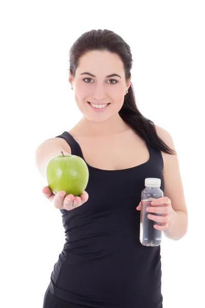 Giovane bella donna sportiva con bottiglia di acqua e apple isol — Foto Stock