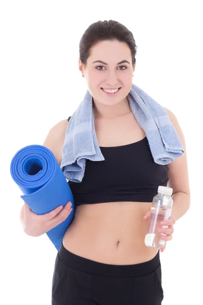 Happy slim woman with yoga mat, towel and bottle of water isolat — Stock Photo, Image