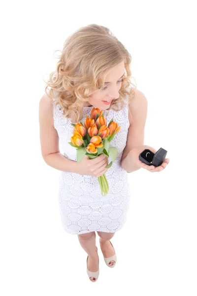 Proposal concept - surprised woman with tulips and little gift b — Stock Photo, Image