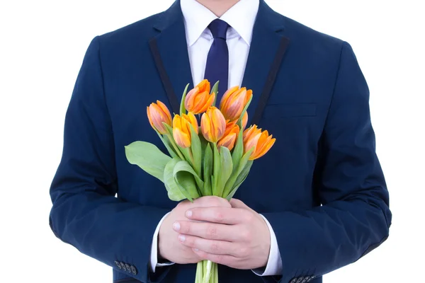 Flores naranjas en manos masculinas aisladas en blanco — Foto de Stock