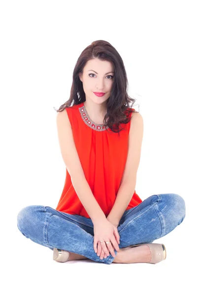 Jeune belle femme mince assise isolée sur blanc — Photo