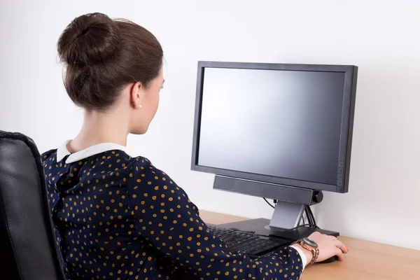 Back view of young beautiful business woman working in office wi — Stock Photo, Image