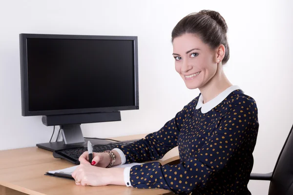 Beautiful business woman working in office and computer with bla — Stock Photo, Image