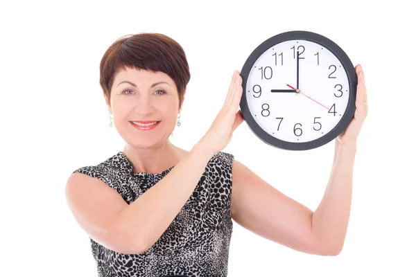 Beautiful middle aged businesswoman holding clock – stockfoto