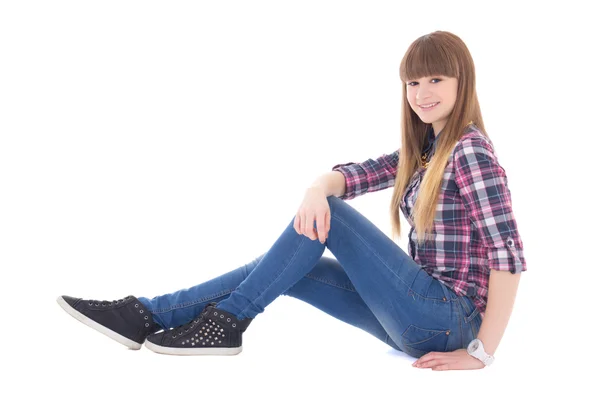 Šťastné dospívající dívka sedící izolované na bílém — Stock fotografie