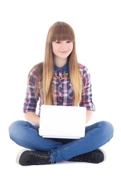 Linda garota adolescente sentado com laptop isolado no branco — Fotografia de Stock