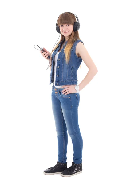 Mooie tienermeisje luisteren muziek met mobiele telefoon isoleren — Stockfoto