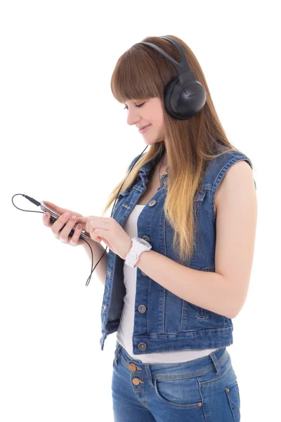 Escuchar música adolescente con teléfono móvil aislado en blanco — Foto de Stock