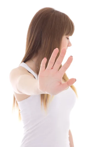 Ragazza adolescente facendo un segnale di stop con mano isolato su bianco — Foto Stock