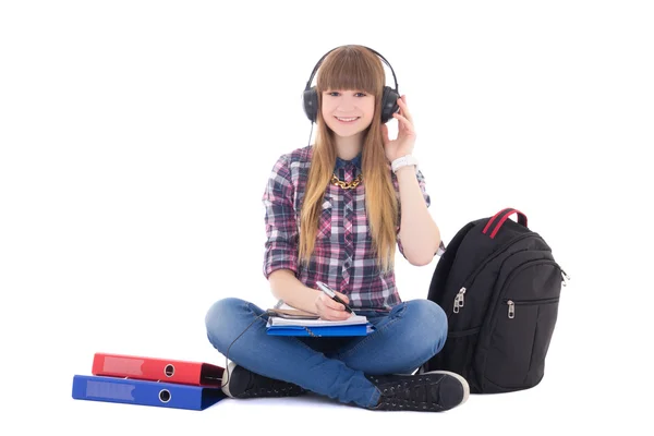 Female student listening music and studying — Stock Photo, Image