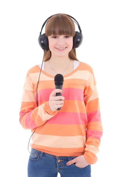 Šťastný, dospívající dívka se sluchátky a mikrofonem izolovaných na wh — Stock fotografie