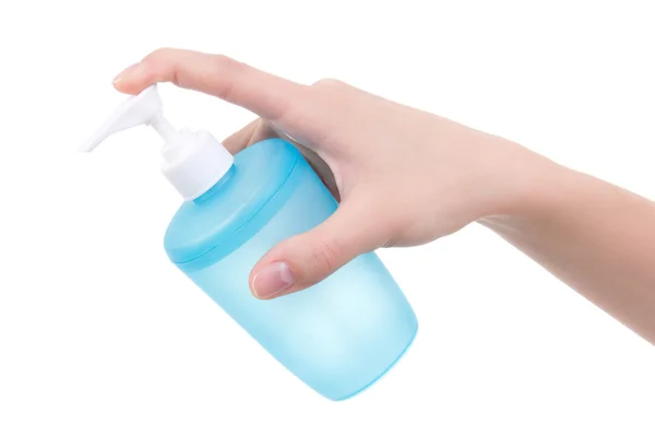 Female hand holding bottle with liquid soap isolated on white — Stock Photo, Image