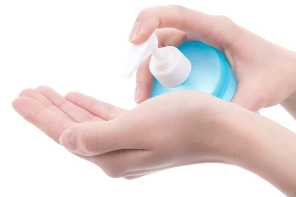 Dávkovač na tekuté mýdlo v rukou ženy izolované na bílém — Stock fotografie