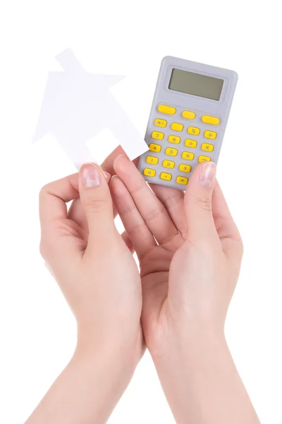 Žena ruce držící kapesní Kalkulačka a papíru dům izolovaný o — Stock fotografie