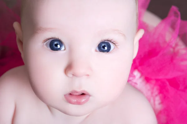 Portrait of funny baby girl with big eyes — Stock Photo, Image