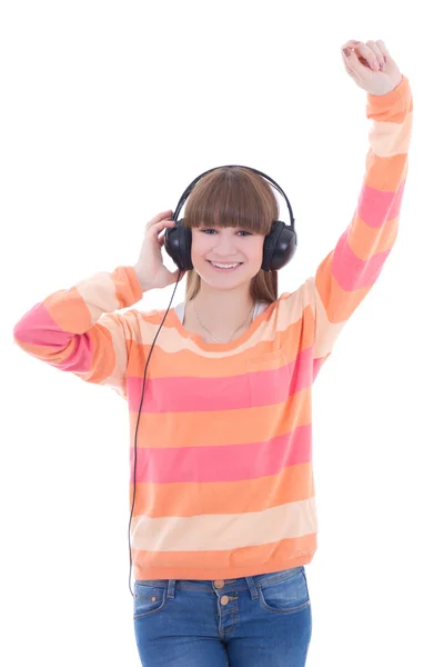 Happy teenage girl listening music in headphones — Stock Photo, Image