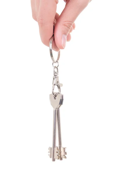 Set of keys in woman hand isolated on white —  Fotos de Stock